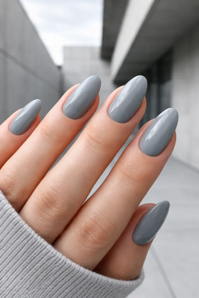 Modern cool stone grey manicure on almond shaped nails