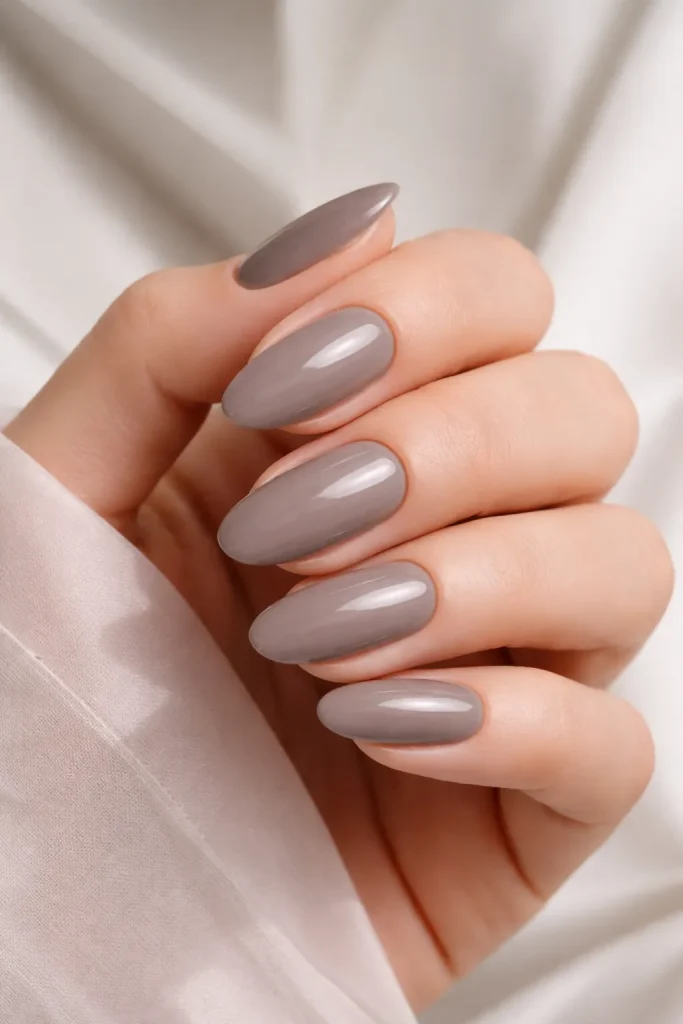 Sophisticated taupe greyish-brown nails with a high gloss finish