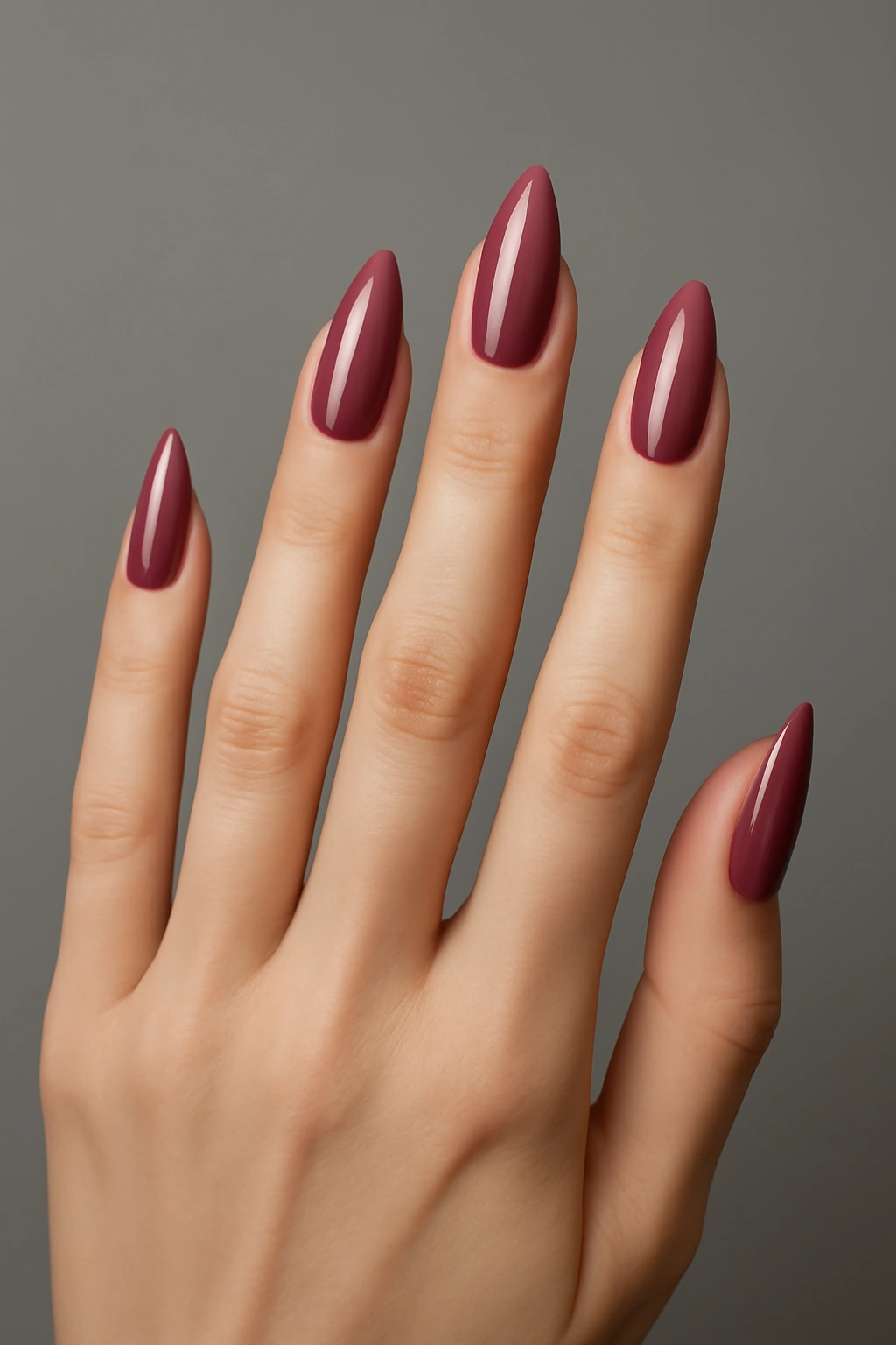 Soft stiletto nail shape featuring a blunt pointed tip on small hands